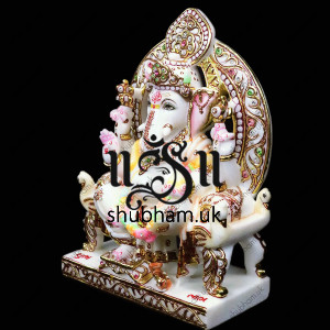 Beautiful Ganesha Seated on Peacock Sinhasan - 13 inch Beautiful Ganesha Seated on Peacock Sinhasan - 13 inch