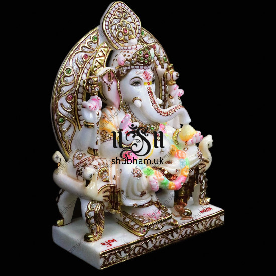 Beautiful Ganesha Seated on Peacock Sinhasan - 13 inch Beautiful Ganesha Seated on Peacock Sinhasan - 13 inch